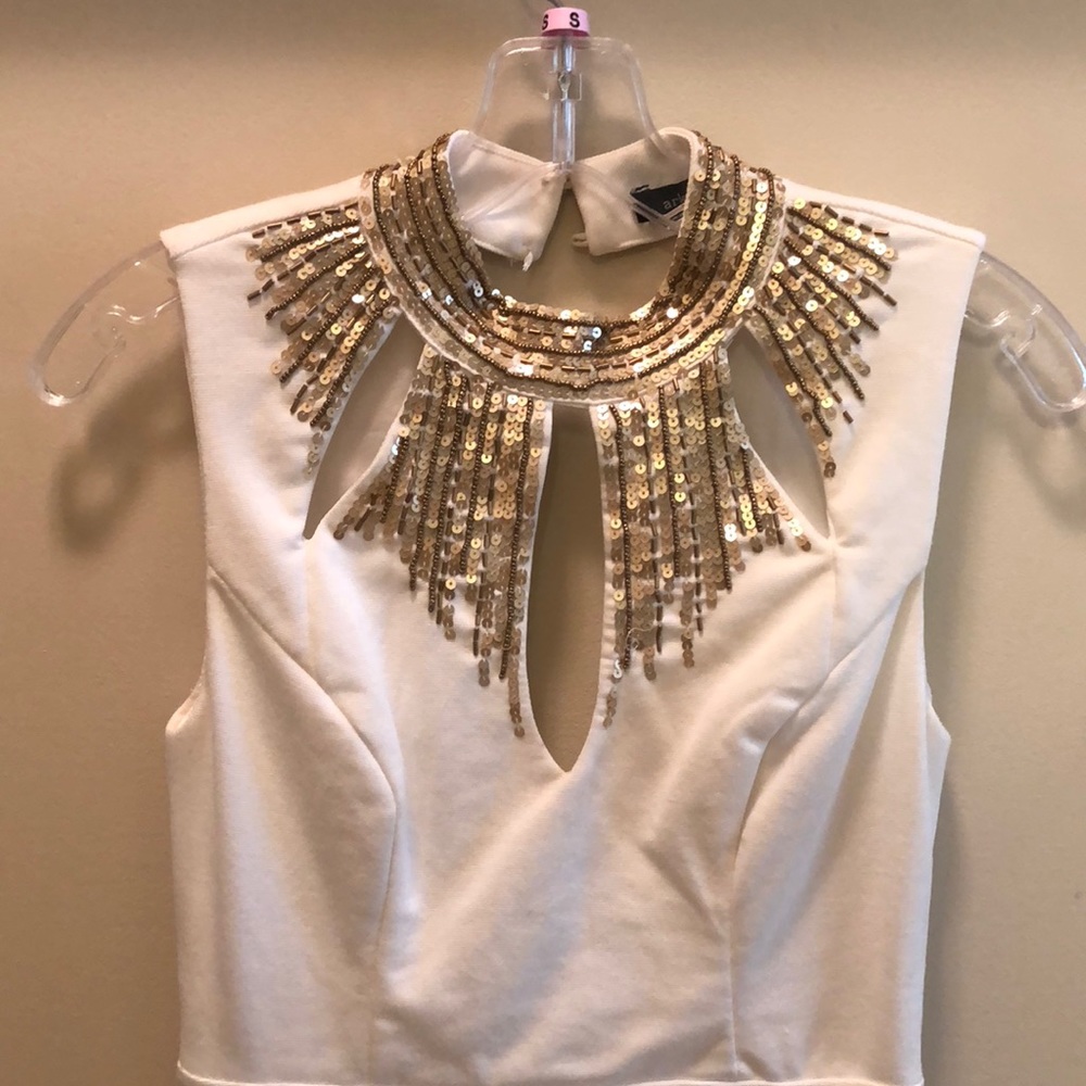 White and gold sequenced dess